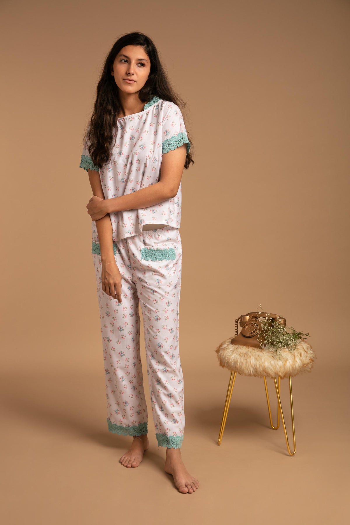 Olivia pyjama suit with floral pattern and delicate lace details.