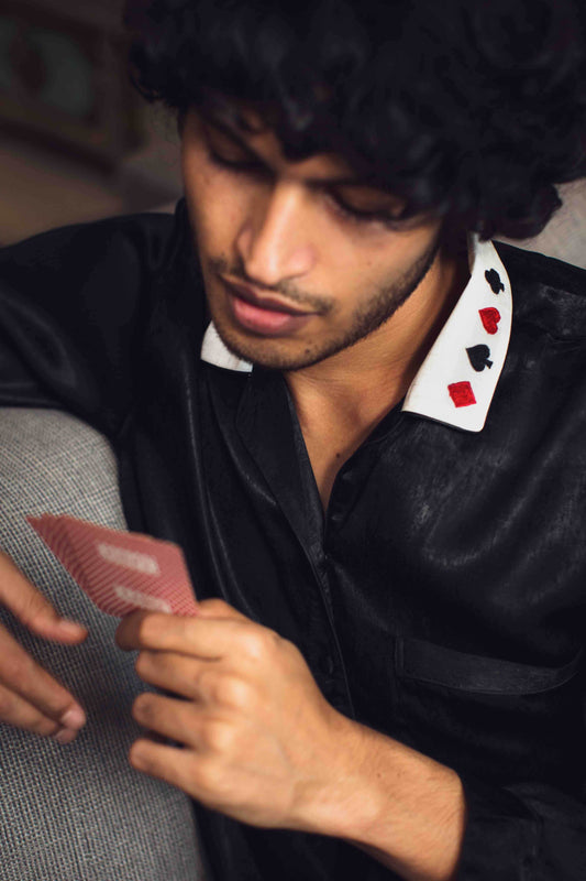 Stylish Play-Boy pyjama suit with unique playing card collar.