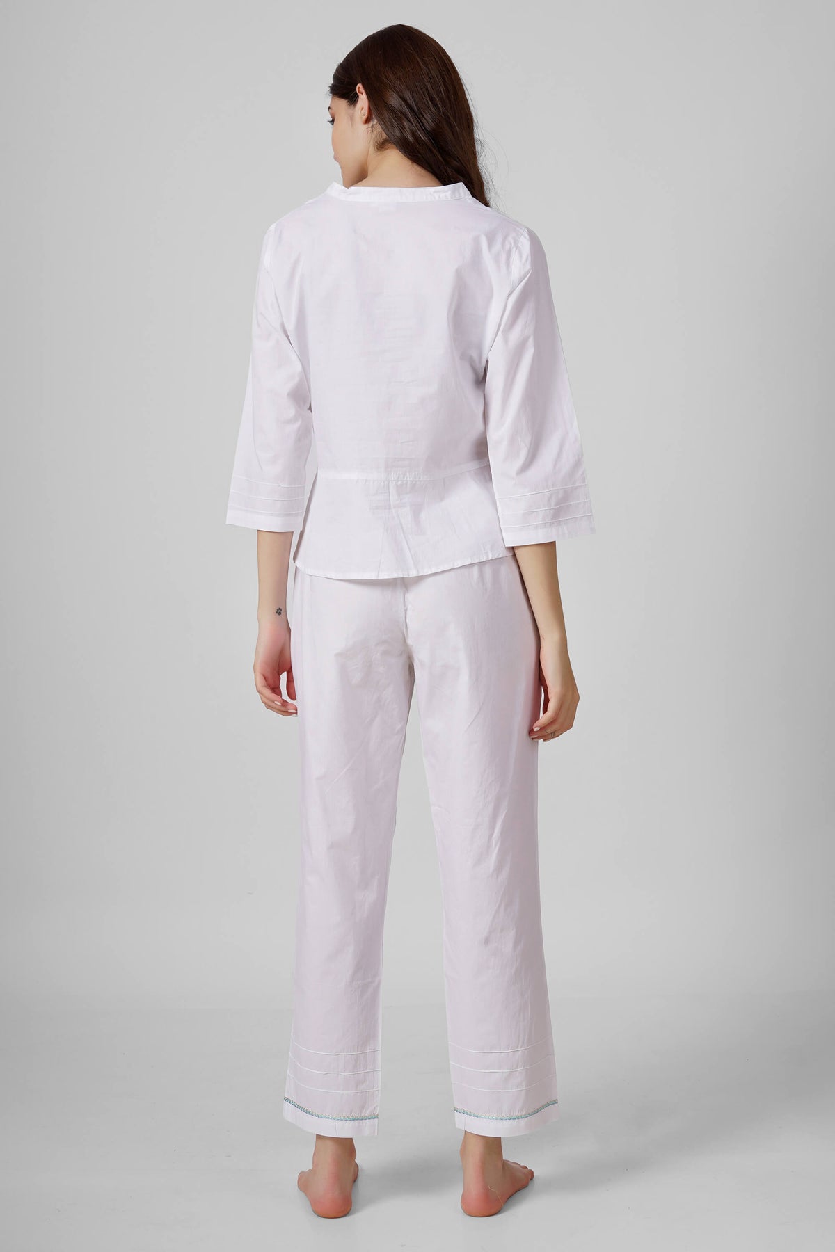 Nora Pyjama Suit for women in elegant white fabric, back view.