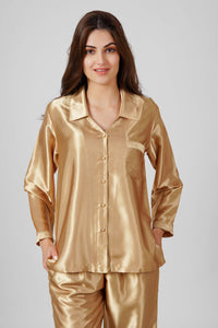 Elegant gold satin pyjama suit for women, stylish and comfortable.