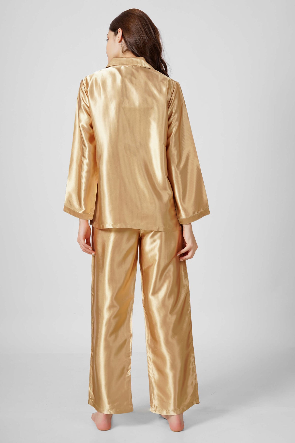 Elegant golden Eden-G pyjama suit for stylish loungewear comfort.