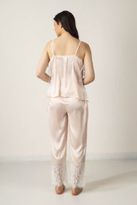 Tina Pyjama Suit in soft pink satin with lace detailing.