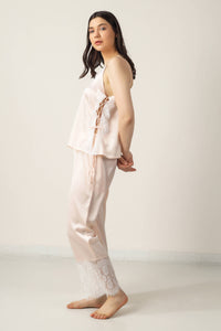Elegant pink Tina Pyjama Suit with lace detailing, perfect for relaxation.