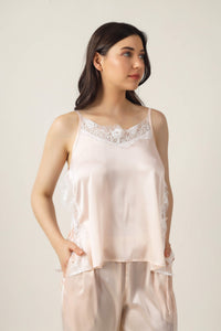 Tina Pyjama Suit featuring elegant lace-trimmed silk top and pants.