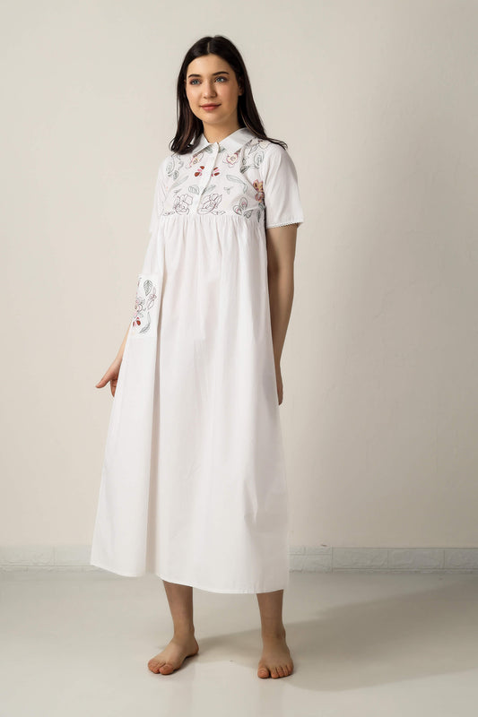 Bailey dress with floral embroidery, perfect for casual outings.