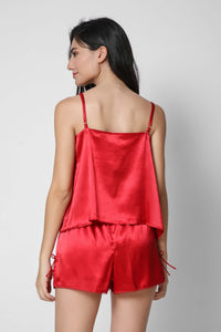 Red satin camisole and shorts set for stylish comfort.