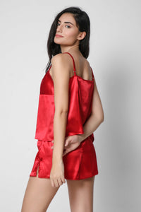 Red satin camisole and shorts set for women.