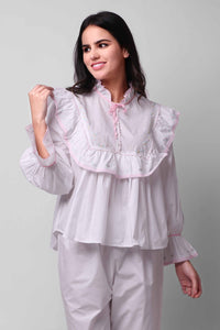 Mary Pyjama Suit featuring ruffled collar and delicate floral embroidery.