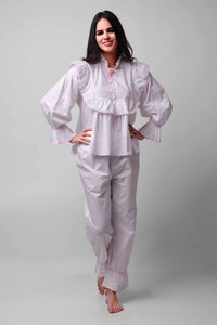 Mary Pyjama Suit in white with frilled details and relaxed fit.