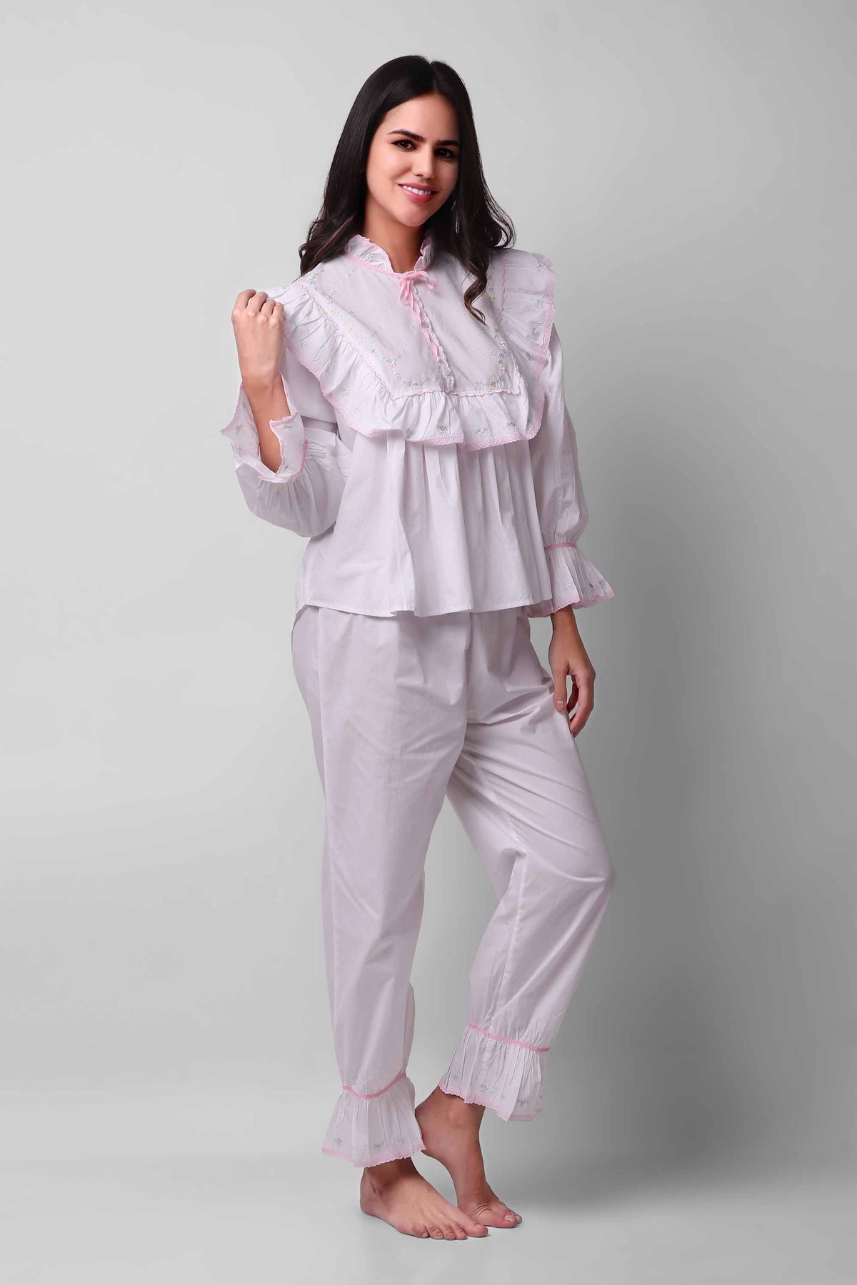 Mary Pyjama Suit featuring a stylish, frilled design in soft fabric.