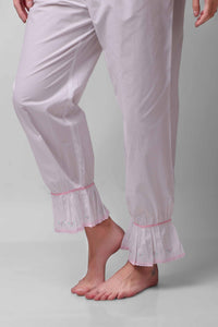 Mary Pyjama Suit featuring delicate lace trim and soft fabric.