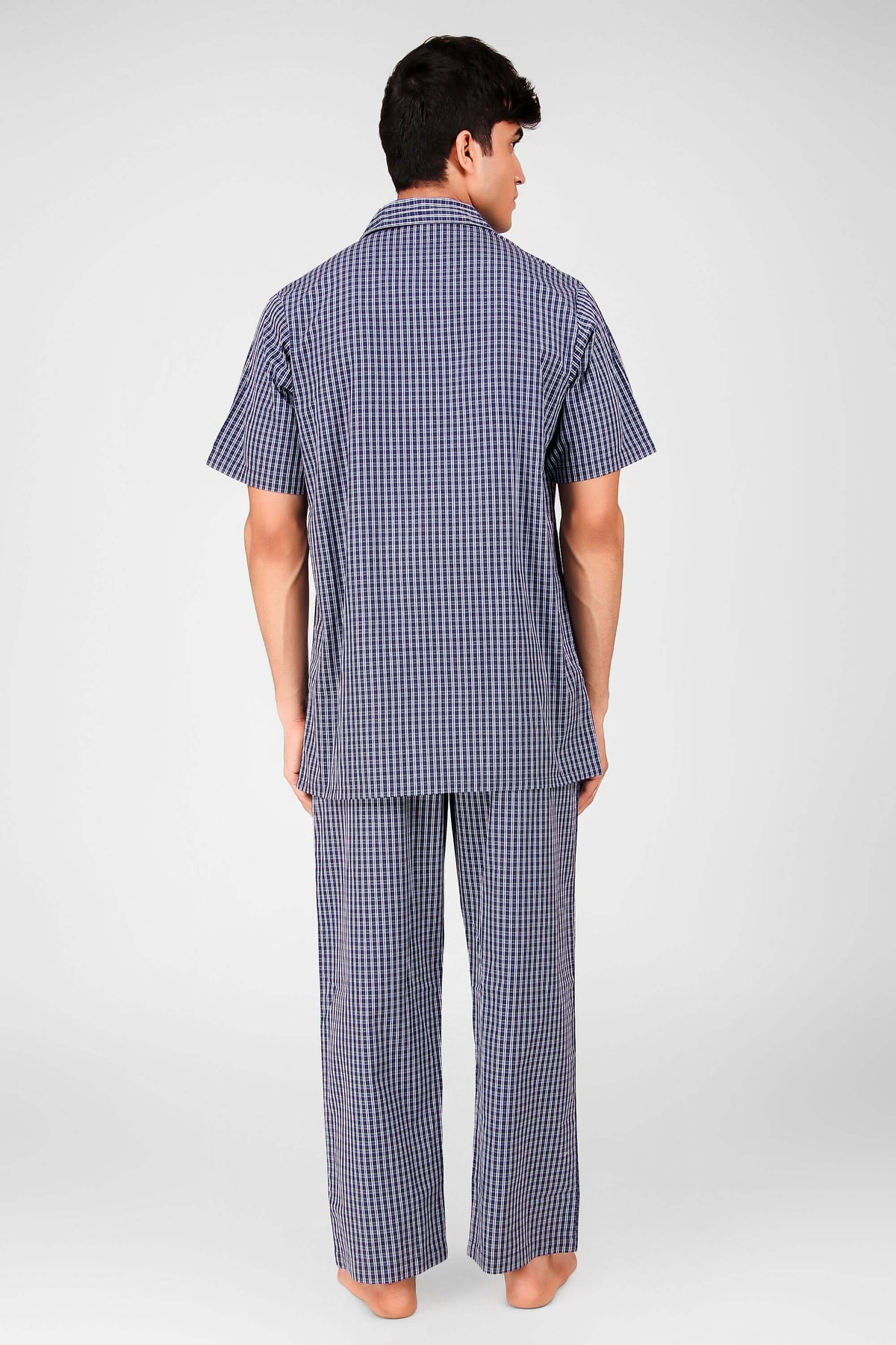 Men's VB pyjama suit in classic check pattern, back view.