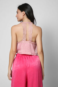 Back view of a model wearing the Queen Set in pink.