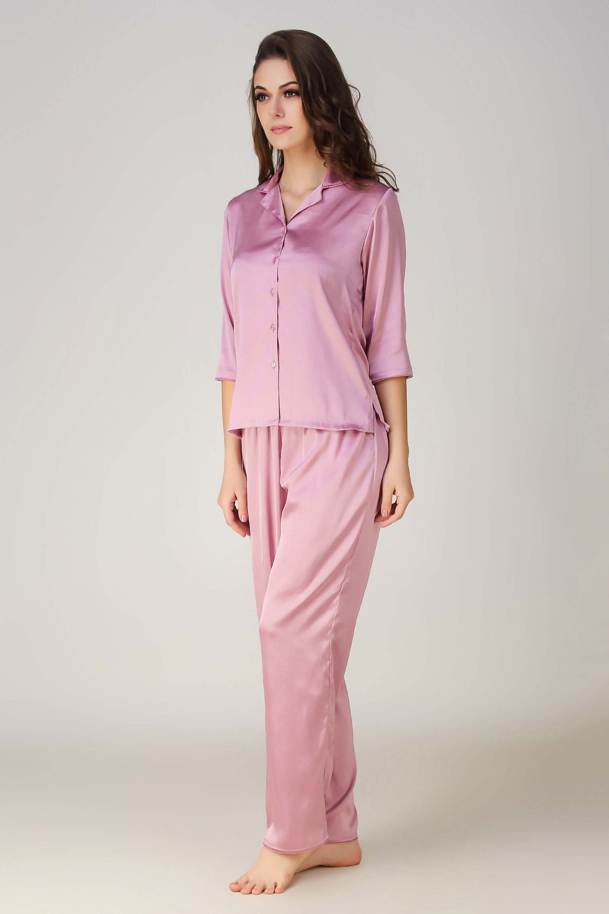 Elegant pink Dani pyjama suit for luxurious comfort and style.