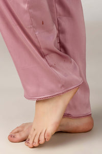 Dani Pyjama Suit in soft pink fabric, stylish and comfortable.