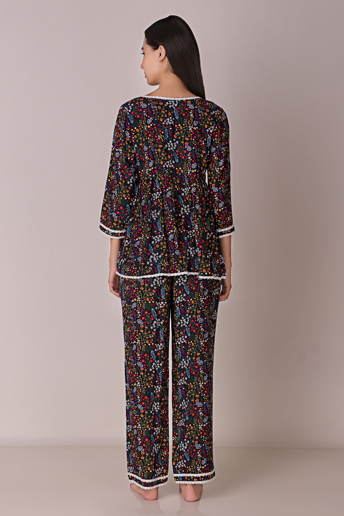 Reva Pyjama Suit floral design, back view, comfortable loungewear.