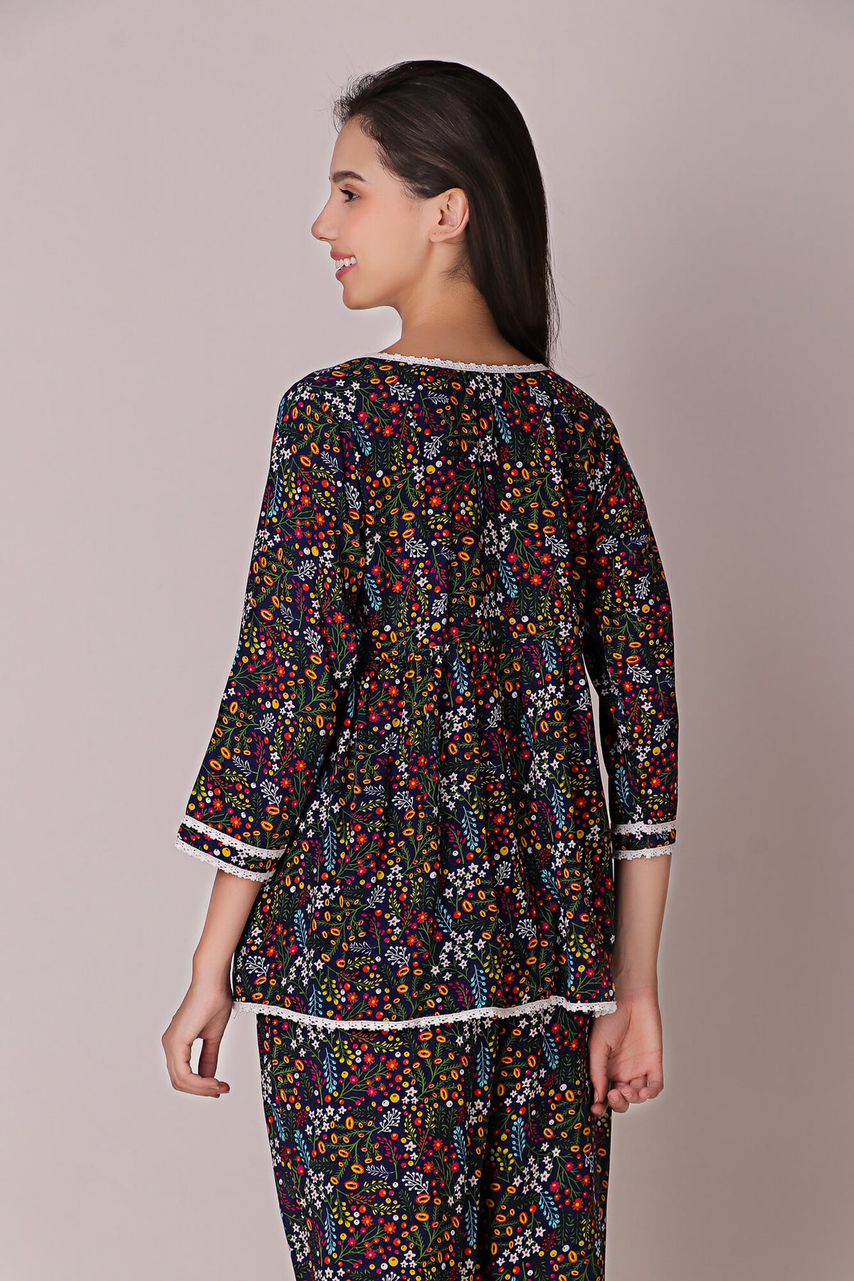 Reva Pyjama Suit with vibrant floral print, perfect for relaxation.