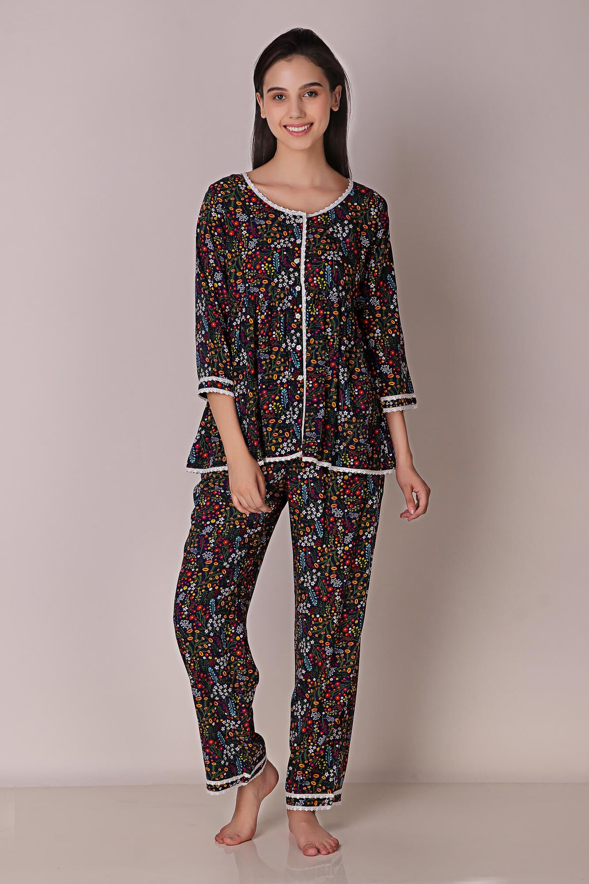 Reva Pyjama Suit featuring colorful floral print and comfy design.