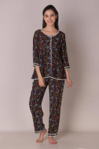 Reva Pyjama Suit featuring colorful floral print and comfy design.