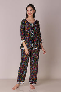 Reva Pyjama Suit in floral print, perfect for relaxed comfort.