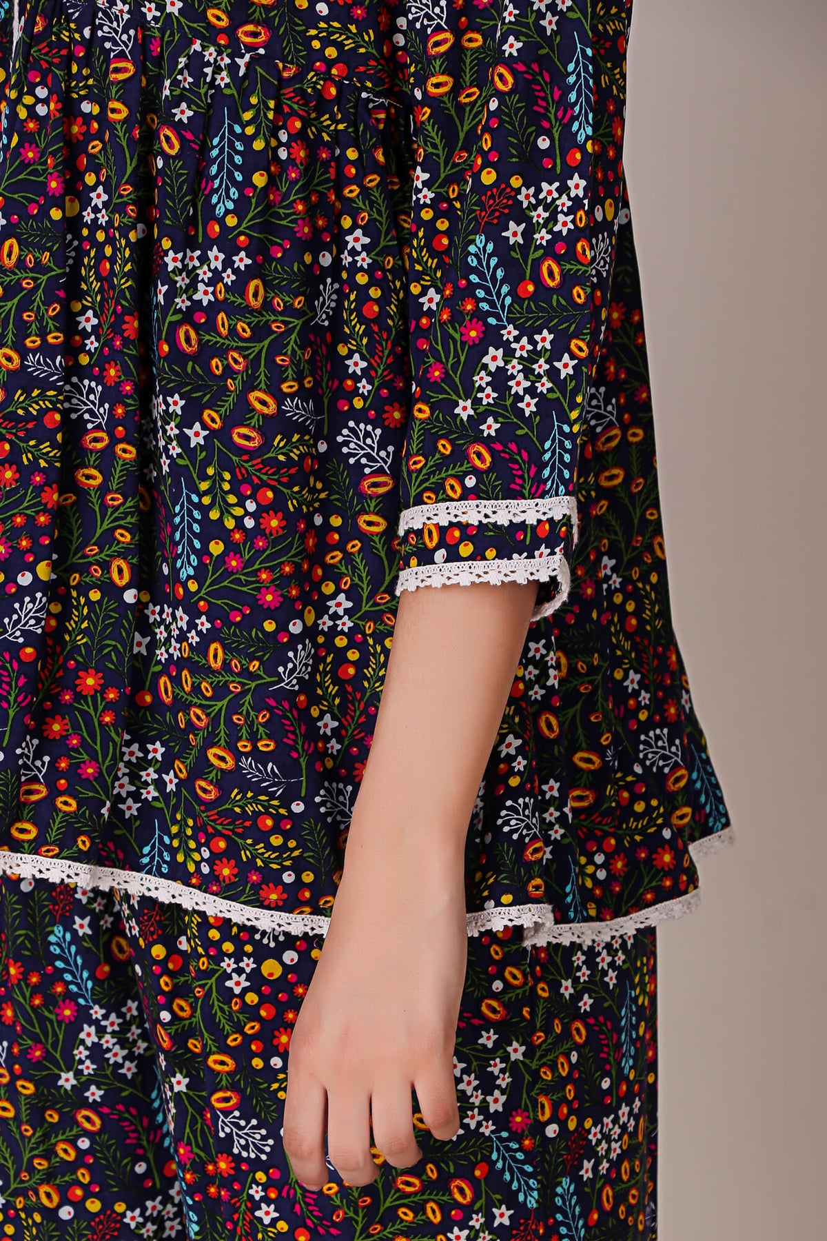 Colorful floral Reva pyjama suit with lace trim details.