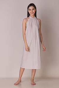 Model wearing Talisa backless dress in elegant pose.