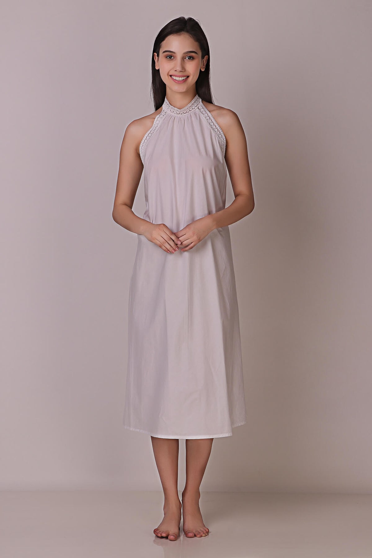 Talisa backless dress and gown displayed on a model.
