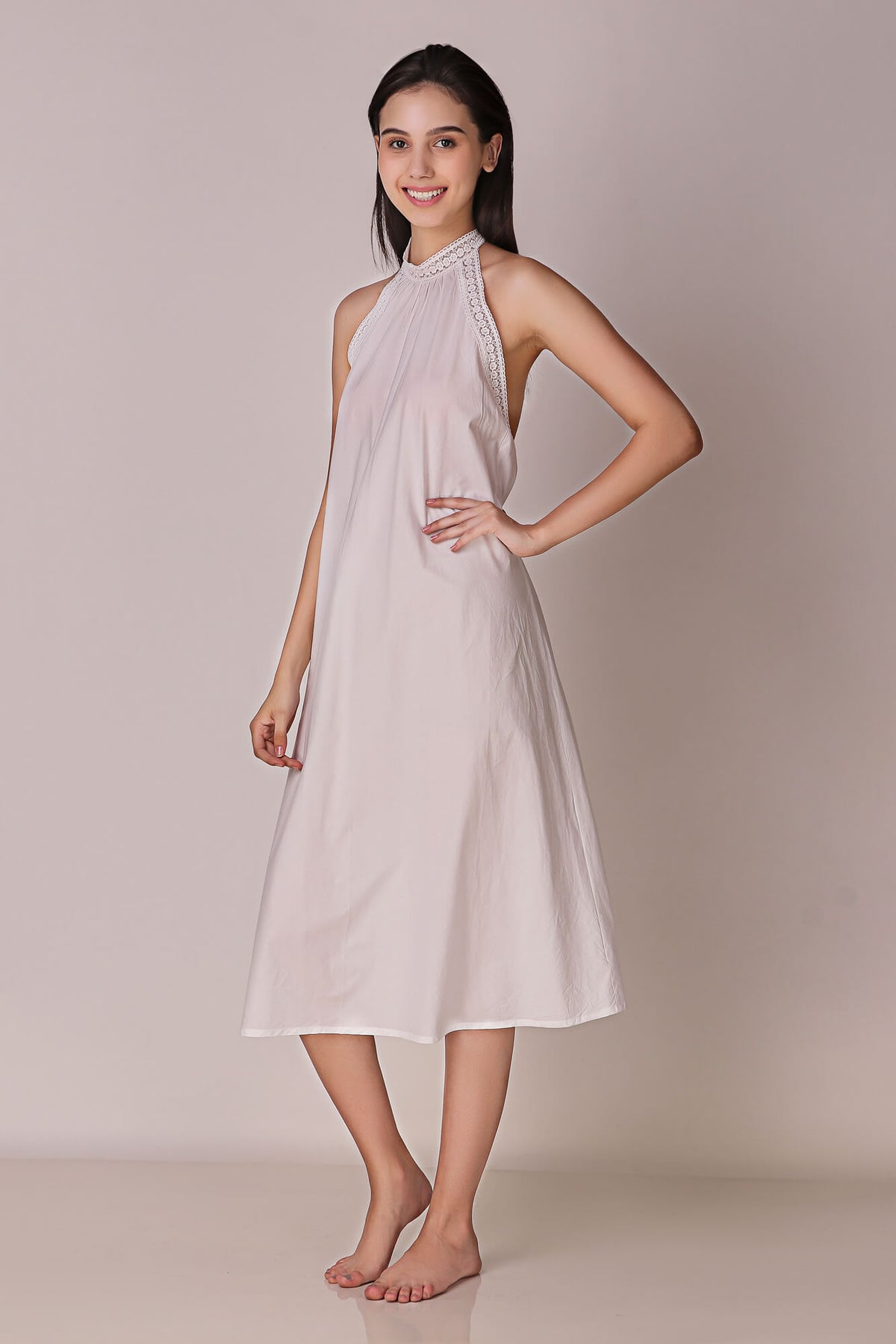 Talisa backless dress showcasing elegant design and relaxed fit.
