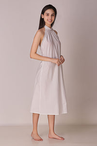 Elegant backless dress and gown, perfect for summer occasions.