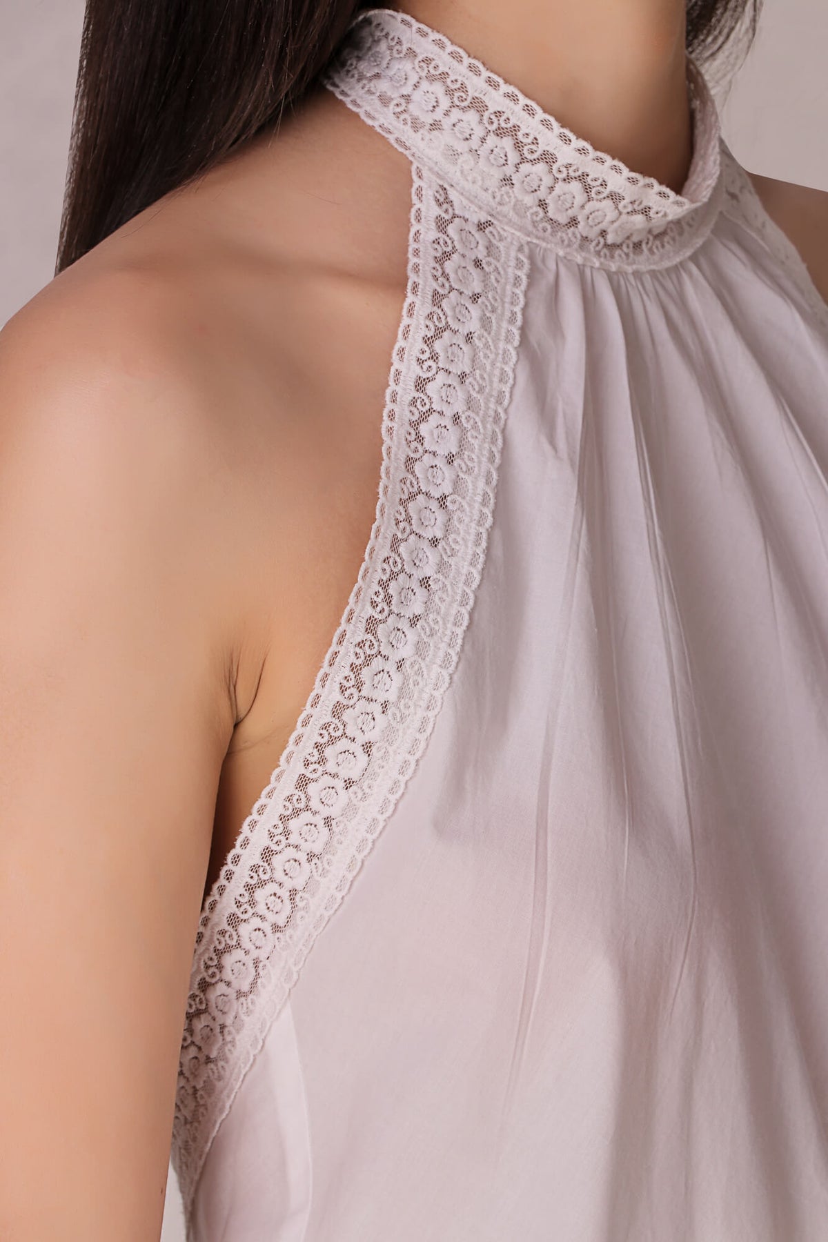 Elegant backless dress with lace detailing for stylish occasions.