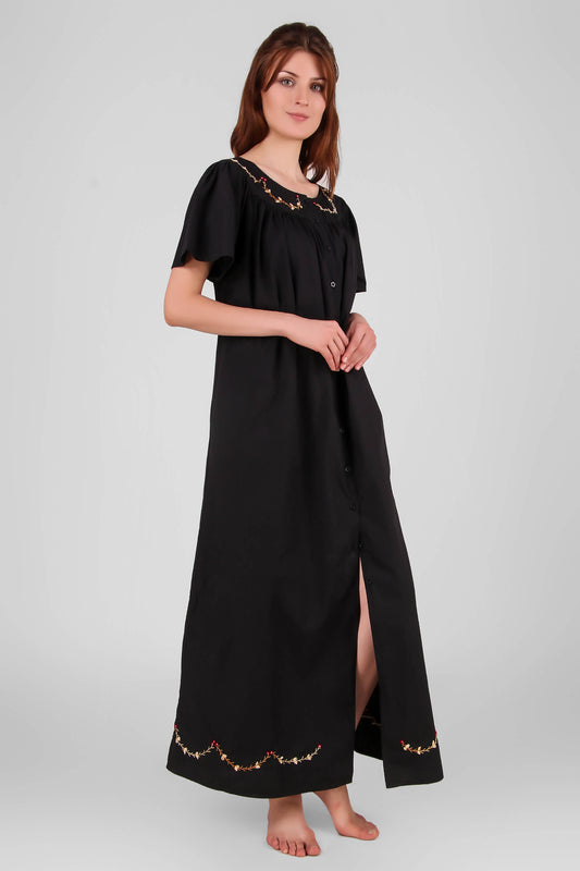 Elegant black nightdress with floral embroidery detail.