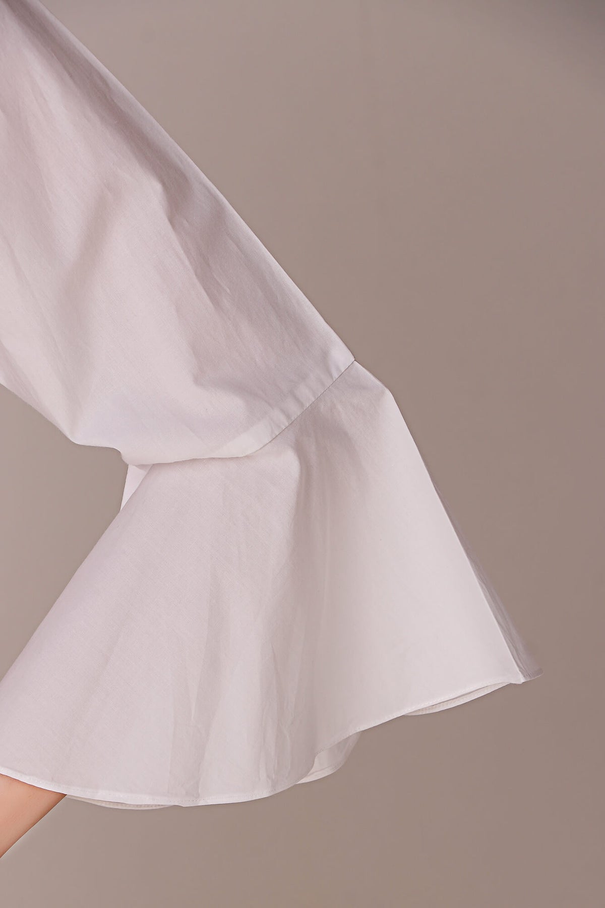 Talisa backless dress sleeve detail with stylish flared design.