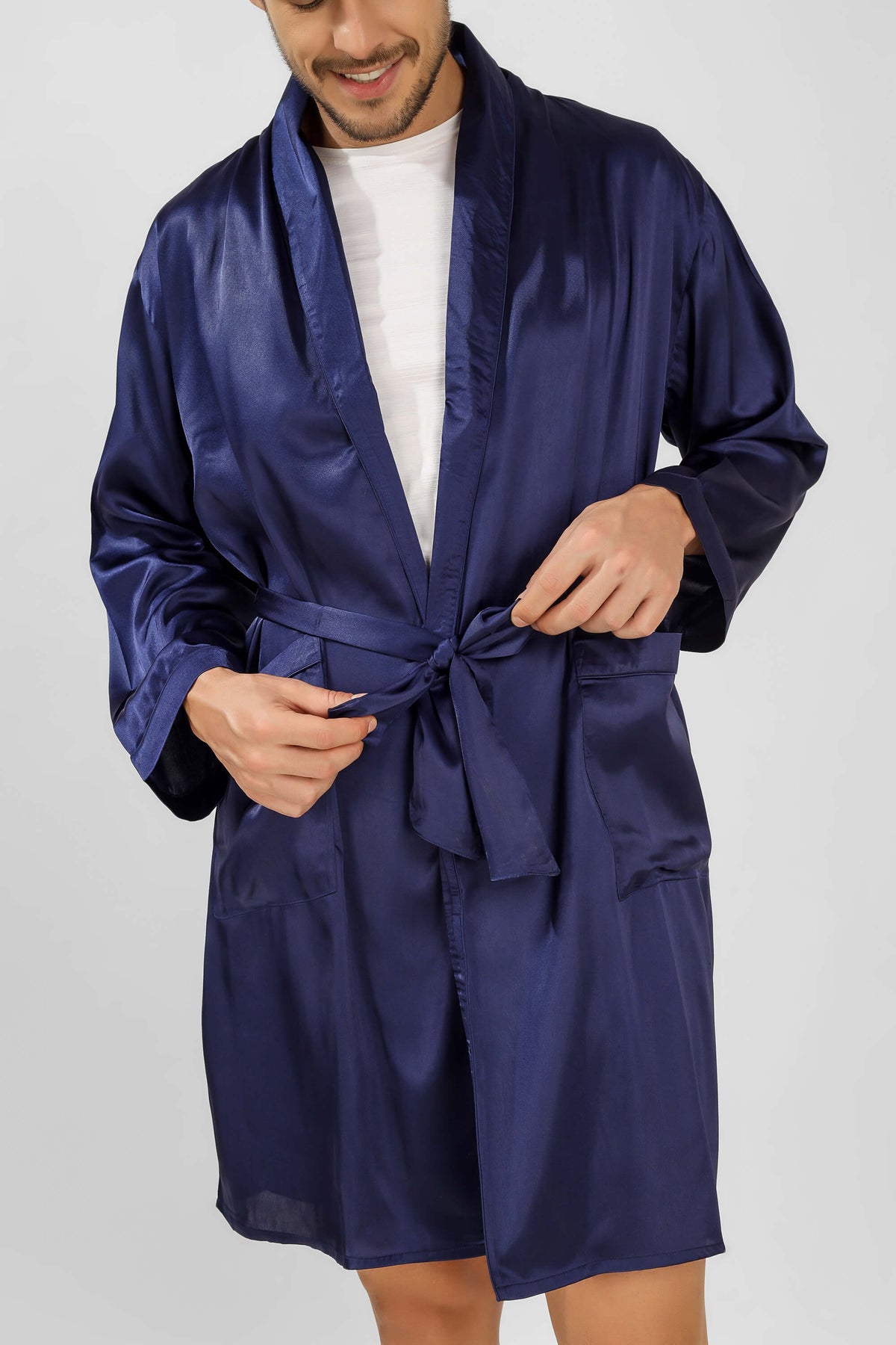 Men's navy satin robe with tie, perfect for lounging.