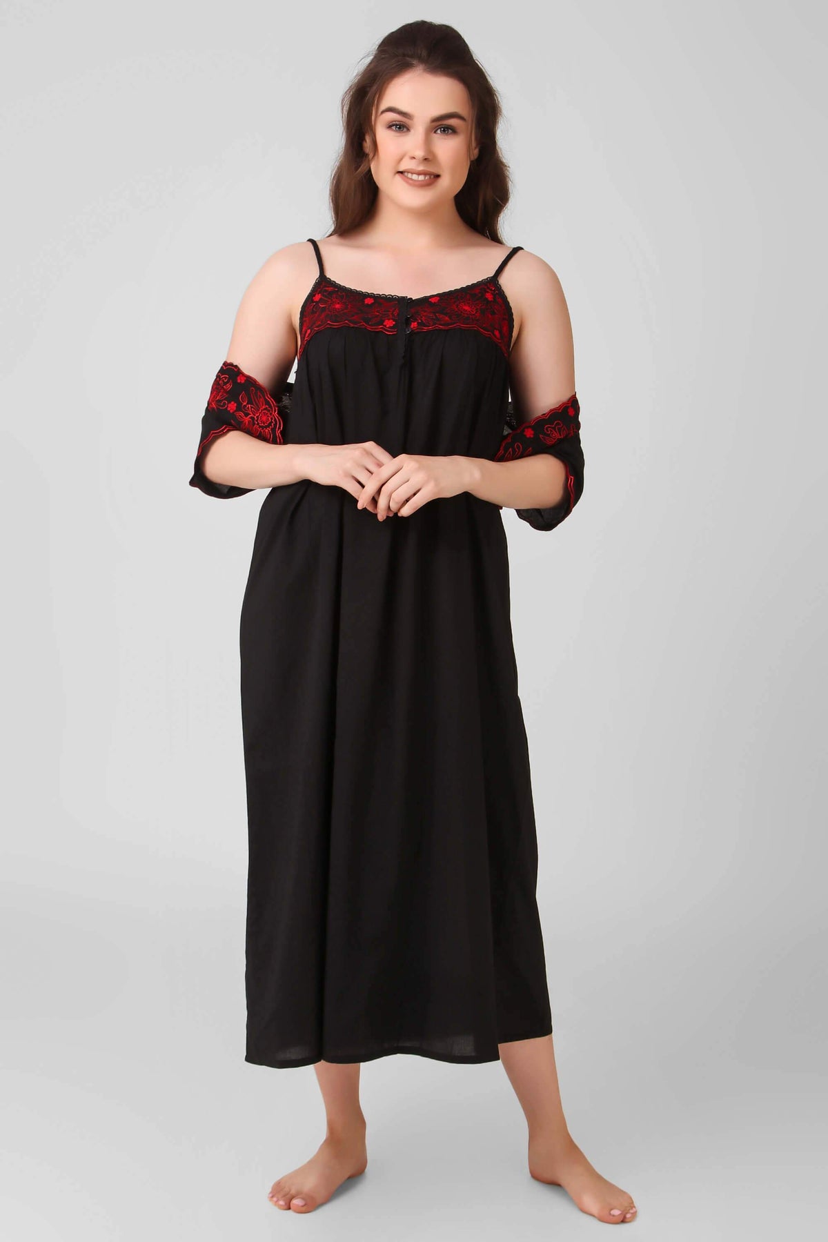 Elegant black bolero dress with red embroidered shrug and spaghetti straps.