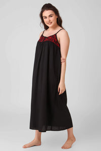 Black dress with red embroidery, perfect for casual or formal occasions.