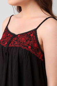 Black dress with red floral embroidery for stylish women.