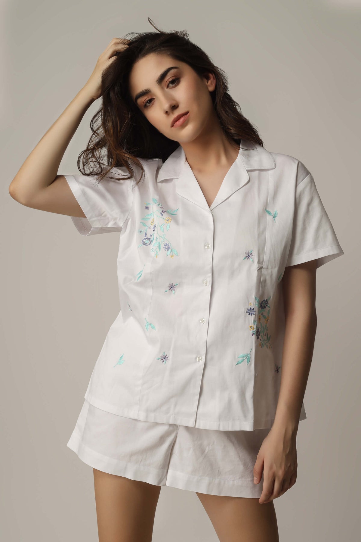 Aviv Top & Shorts set, elegant white floral design for casual wear.