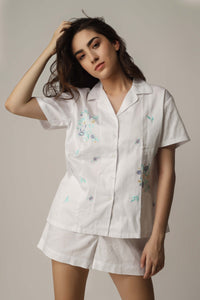 Aviv Top & Shorts set, elegant white floral design for casual wear.