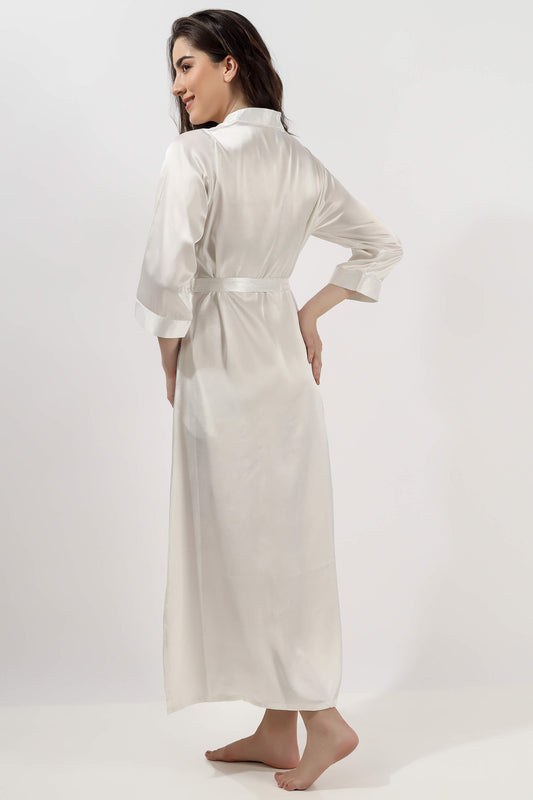 Elegant embroidered gown in white, showcasing a stylish back design.