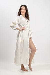 Elegant embroidered gown with floral design, perfect for any occasion.