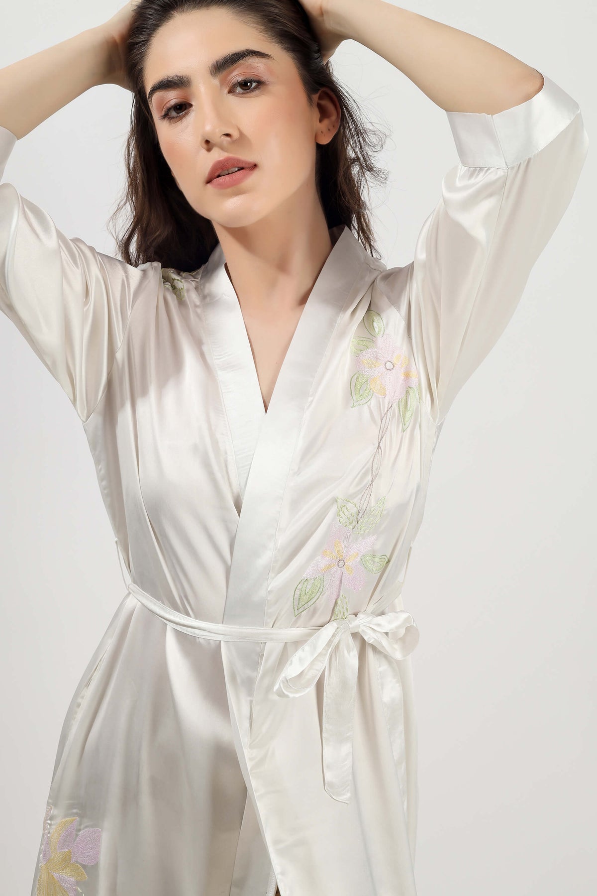 Elegant embroidered gown for women, featuring delicate floral design.