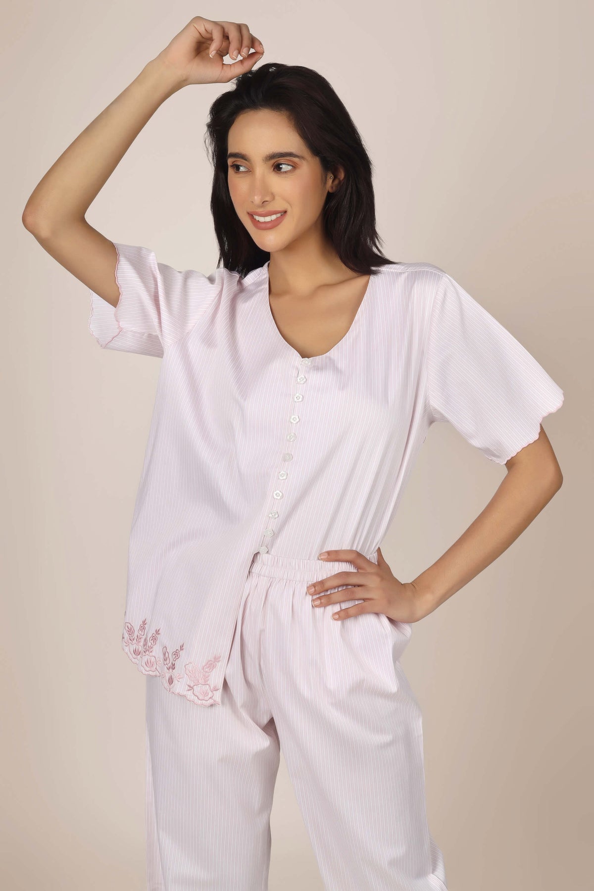 Cory Pyjama Suit in soft pink with stylish floral embroidery.