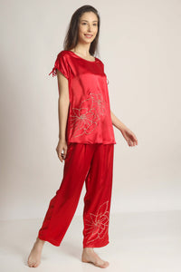 Red satin Ingka pyjama suit with floral embroidery design.