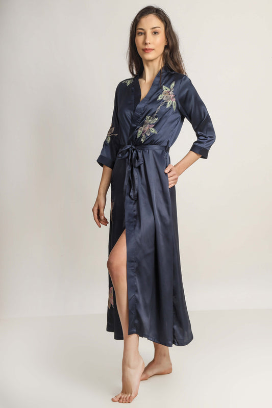 Elegant navy embroidered gown with a stylish wrap design.