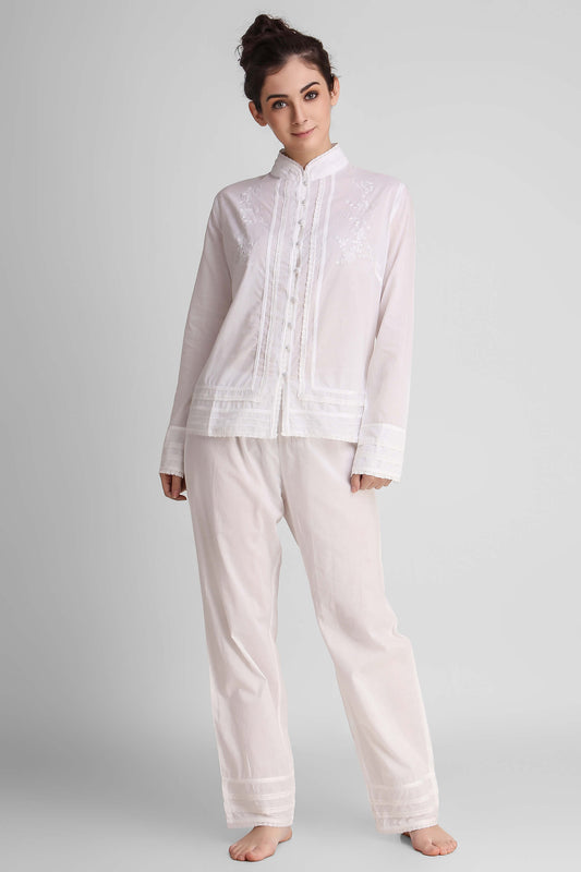Clarisse Pyjama Suit in elegant white with embroidered details.