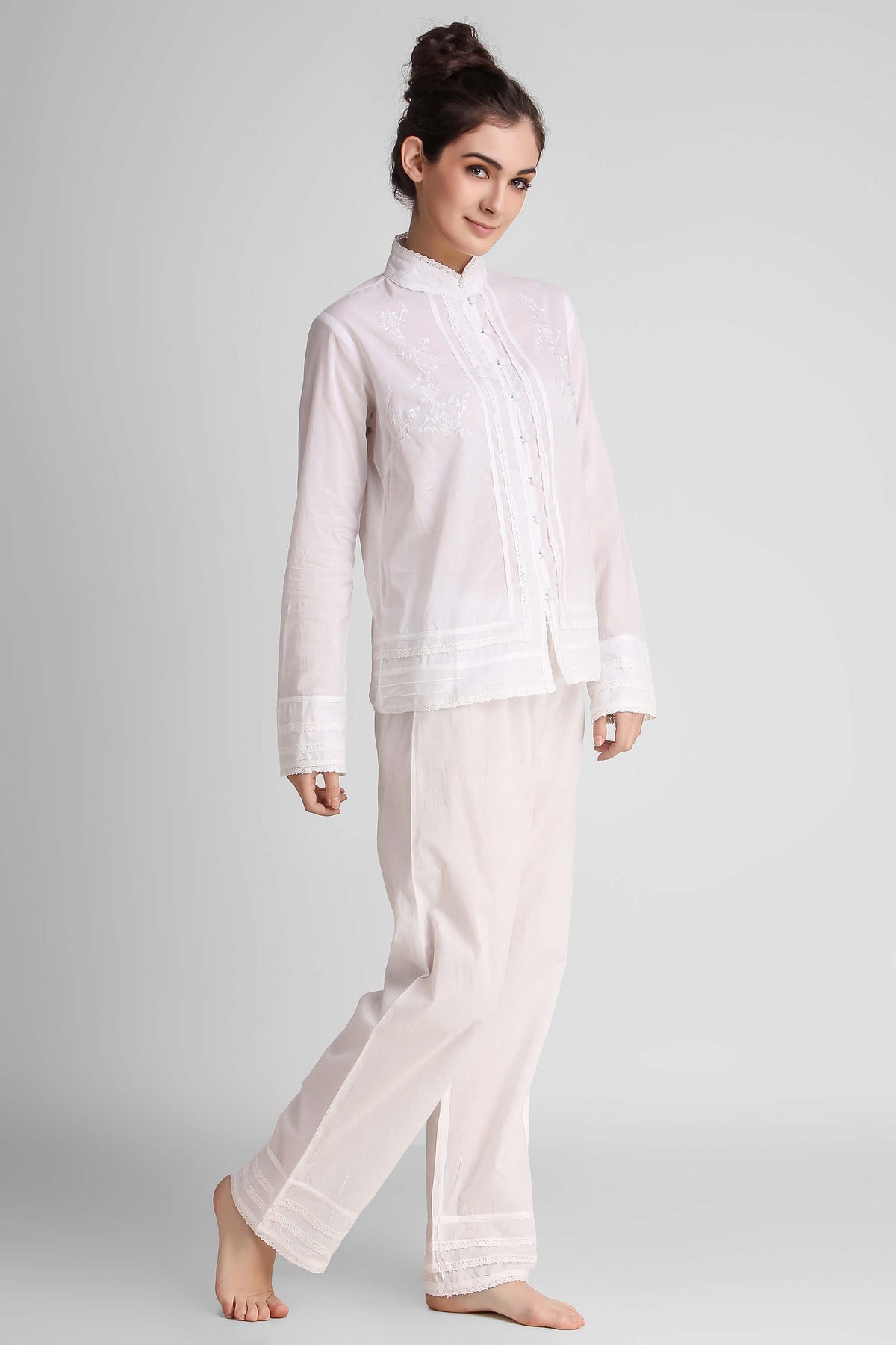 Elegant white Clarisse pyjama suit for stylish comfort at home.