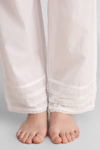 Elegant white pyjama suit with lace trim details.