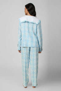 Soft blue sailor pyjama suit with floral pattern, stylish back view.
