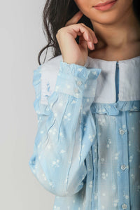 Sailor pyjama suit in light blue with floral design.