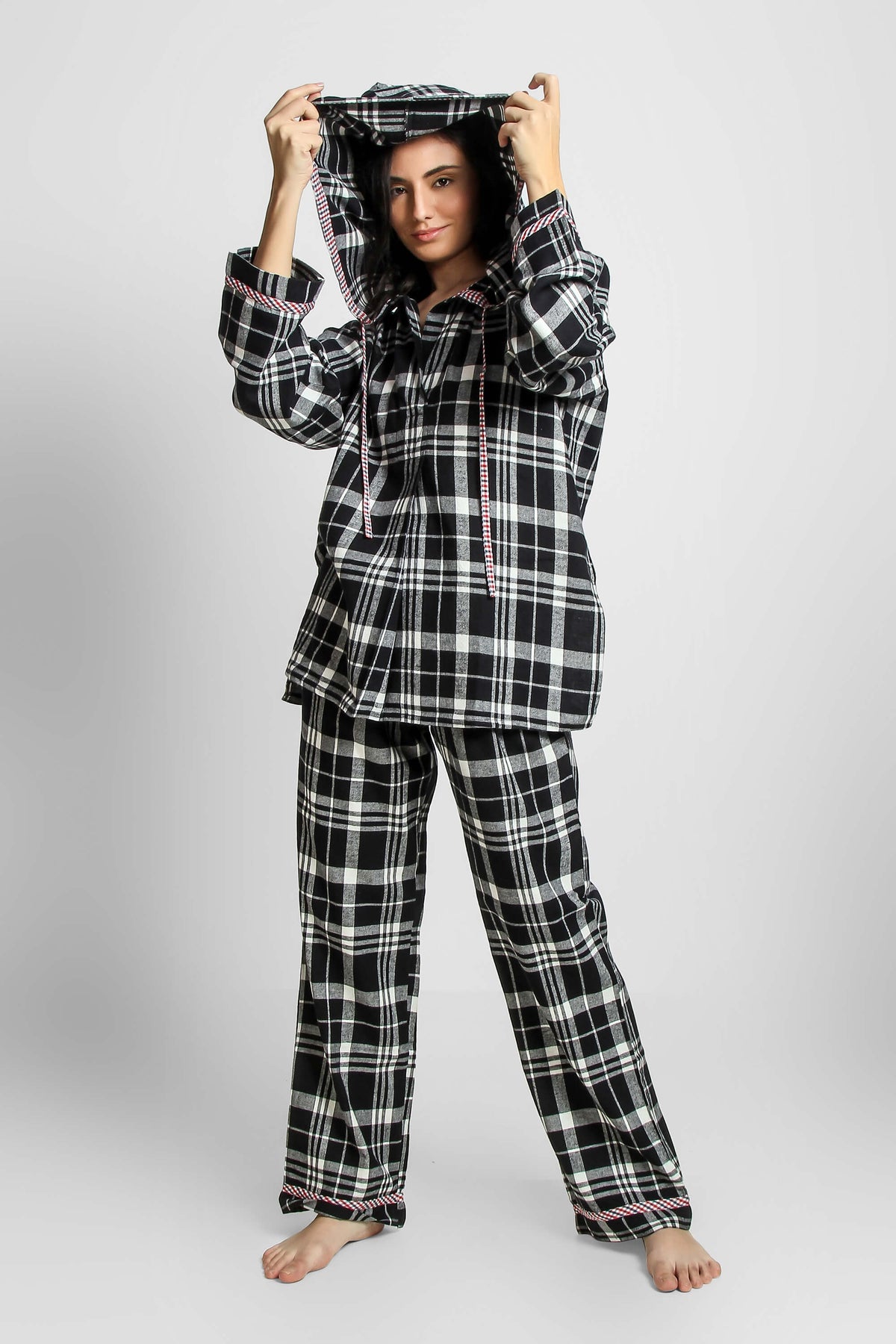 Black and white plaid hoodie pyjama suit for cozy lounging.